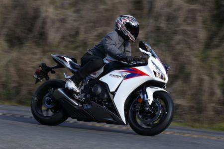 2012 honda cbr1000rr review video motorcycle com, Riders of all shapes and sizes will feel comfortable on the CBR as its riding position is relatively roomy for a supersport literbike