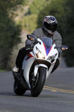 2012 honda cbr1000rr review video motorcycle com, Our particular test bikes were equipped with the new Bridgestone Hypersport S20 tires Dunlop Qualifier Q2s are the alternate rubber They handled the varying wet dry conditions of the street ride very well