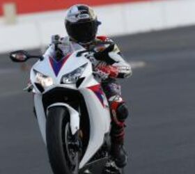 2012 honda cbr1000rr review video motorcycle com, Former Daytona 200 winner and longtime Honda rider Jake Zemke was on hand to ride with us journos And that s our GoPro video camera capturing Jake s wild lap