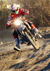 dirt and street with the 06 bmw hp 2 motorcycle com, The BMW turns better when there are ruts to hold the tires However once you get used to the way it slides it s possible to make good time on the flat stuff