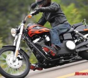 2010 harley davidson dyna wide glide review motorcycle com, The Wide Glide s exhaust system limits cornering clearance on the right side