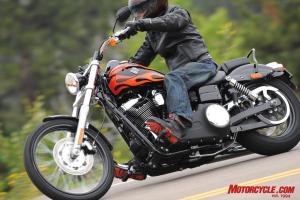 2010 harley davidson dyna wide glide review motorcycle com, The Wide Glide s exhaust system limits cornering clearance on the right side