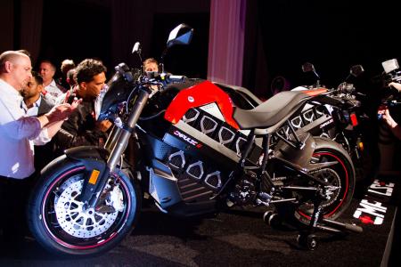 2012 brammo empulse and empulse r first look motorcycle com, The much anticipated 2012 Empulse R from Brammo made its public debut at a trendy nightspot in Hollywood California Note the carbon fiber fenders and headlight shroud which are available only on the R model