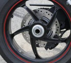 2012 triumph speed triple r review motorcycle com, Forged five spoke wheels from PVM shed significant reciprocating mass and help the Speed Triple R in virtually every performance category