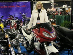 cheesecake in the heartland 2006 indianapolis motorcycle dealer s expo, Cyndee s ridden some of her products they re a ball