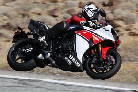 2012 yamaha yzf r1 review video motorcycle com, In honor of Yamaha s 50th year in Grand Prix racing the company has created a limited edition 2000 units commemorative red white livery for the R1 The YZF R6 will also get the commemorative treatment