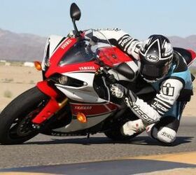 2012 yamaha yzf r1 review video motorcycle com, Once the R1 is on its side stability is superb