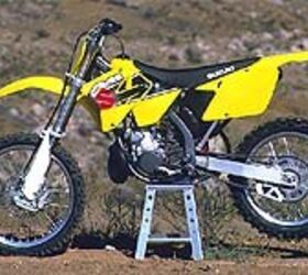 2001 suzuki rm250 motorcycle com, New plastic and graphics bring the RM250 up to date with the other quarter liter competitors