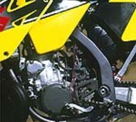 2001 suzuki rm250 motorcycle com, Rear frame sections reminds us of Kawasaki perimeter frame