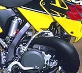 2001 suzuki rm250 motorcycle com, Changes to the motor are aimed at boosting low to mid rpm power