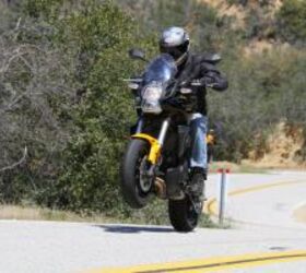 2012 650 adventure tourer shootout video motorcycle com, The Kawasaki s parallel Twin isn t the most powerful of the three engines in the test but it wheelies with ease nevertheless