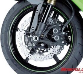 2008 kawasaki zx 10r preview motorcycle com, New calipers utilize different sized pistons for improved feel at the lever and pinch slightly thinner petal rotors This should be a welcome change from last year s ZX 10R as its brakes had a spongy feel especially compared to the brakes on the 10R s competition