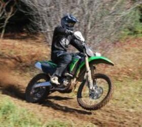 2011 kawasaki kx250f review motorcycle com, The KX will carve but is still a bit clumsier in turns than Suzuki or Honda 250Fs