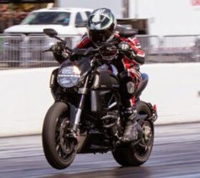 2012 ducati diavel cromo vs star vmax video motorcycle com, The Diavel launches like a rocket ship without much fear of a big wheelie