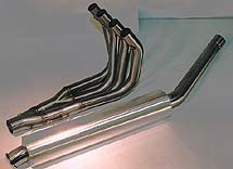 the gms exhaust system for the yamaha yzf r6, The GMS four into two into one stainless steel exhaust system Not shown are the stainless manifold spigots that the head pipes connect to the canister clamp and rubber grommet and the springs that hold the whole collection together