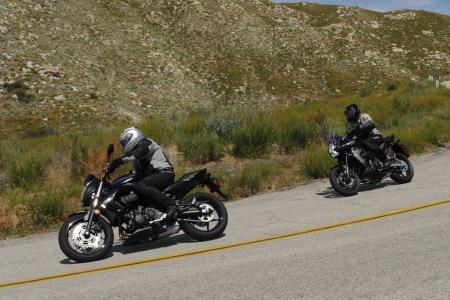 2010 kawasaki versys review motorcycle com, See the stylistic family resemblance between the Versys and shorter travel ER 6n The Versys has more sophisticated suspension and stronger midrange power and is every bit as much the sporting machine as the ER
