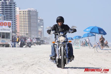 2009 victory cory ness signature jackpot review motorcycle com, The fat rear tire works well on the sand but Fonzie found out the skinny front tire has a tendency to knife into soft surfaces