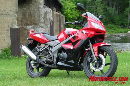 2010 kymco quannon 150 review motorcycle com, The Quannon 150 borrows many styling cues from the Honda CBR125R