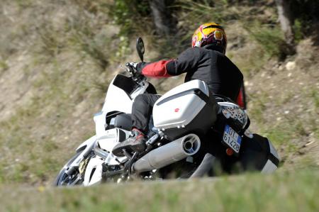 2011 moto guzzi norge 1200 gt8v review motorcycle com, We suspect Moto Guzzi will address the loose muffler bolts before the Norge hits dealerships