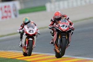 bayliss stretches lead in valencia, Noriyuka Haga 41 fends off Troy Bayliss 21 to win race two in Valencia