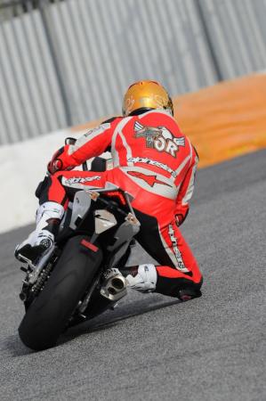 2010 aprilia rsv4 r review motorcycle com, Like WSBK rider Max Biaggi Tor says he feels at home on the RSV4 R