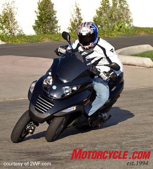2008 piaggio mp3 400 review motorcycle com, Even with two wheels up front the MP3 really lets you lean into corners