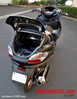 2008 piaggio mp3 400 review motorcycle com, The rear trunk is big enough to hold two helmets or perhaps a mini keg of beer if the situation calls for it