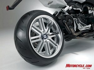 2007 tokyo motor show, The trio of MotoGP style slash cut megaphones and the massive rear tire make it clear that Honda s designers have been taking inspiration from the custom sportbike movement