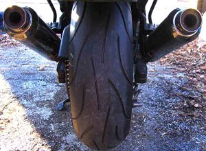 michelin pilot power 2ct tire review, The tread pattern just 12 of the carcass for a bigger contact patch on this fat 180 50ZR 17 compares nicely with your fave high speed sweepers a not so subliminal reminder to get down