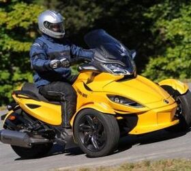 2013 can am spyder st s roadster review motorcycle com, Recognizable by its Carbon Black six twin blade spoke front wheels the new Can Am Spyder ST S is the middle child between the standard ST and accessorized ST Limited Note the optional Akrapovic exhaust