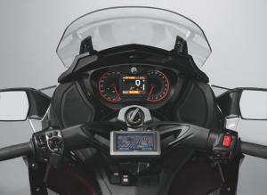 2013 can am spyder st s roadster review motorcycle com, The ST Limited s cockpit from the rider s point of view The Garmin GPS unit is connectable via Bluetooth but the stereo requires a hardline