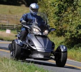 2013 can am spyder st s roadster review motorcycle com, The ST S Spyder in its more subdued Pure Magnesium Metallic color scheme As a sport touring model with long distance intentions customers may be interested in the RT 622 trailer available at Spyder dealers