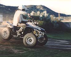 1997 yamaha warrior motorcycle com, Associate Editor Billy Bartels showing some daylight under the right rear