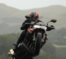 2010 kawasaki z1000 review motorcycle com, Even in the rain the thrilling new Z1000 satisfies