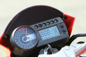 2010 hyosung gt650 review motorcycle com, The compact gauge package is of the style we prefer most an analog tach complemented by an LCD to handle the rest of the info
