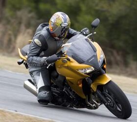 2010 honda cbf1000 review motorcycle com, A firm suspension makes the CBF1000 turn like it was on rails but relaxed steering geometry slows quick turning transitions It makes a better street bike than a track bike