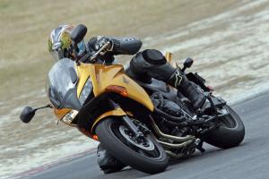 2010 honda cbf1000 review motorcycle com, Bridgestone BT57s limit high speed cornering traction which is a good thing all you ll be grinding is the footpeg feelers