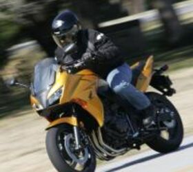 2010年本田摩托车com cbf1000审查,一个新的铝框架提供了一个严格的平台向flex免费乘车