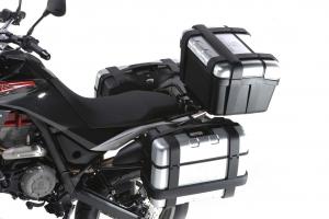 2013 husqvarna tr650 review motorcycle com, If the TR s standard luggage rack isn t enough for your cargo needs Husky offers hard shell saddlebags a topcase and a rear softbag