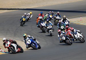 bmw hp2 sport in club racing action, Brian Parriott and his German BMW 46 center surrounded by Japanese bikes