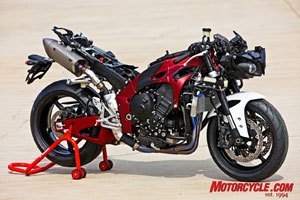 2009 yamaha r1 review motorcycle com, Other than the brake calipers pretty much everything you see here is new to Yamaha s R1