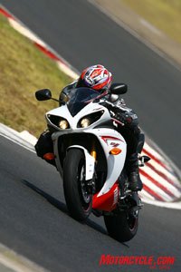 2009 yamaha r1 review motorcycle com, Getting the power to the pavement is easy thanks to the R1 s new motor