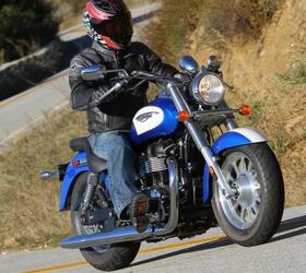 2012 triumph america review motorcycle com, Despite being a humble middleweight the America has many features that make it feel and look like a bigger cruiser Part of that bigger bike appeal is a very roomy comfortable ergonomic layout