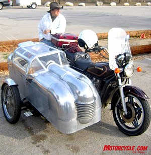 hansen dam show and ride, One of the more radical sidecars an all alloy hand formed one off that looked a bit like a coffin but was actually an expandable camper that you can sleep in