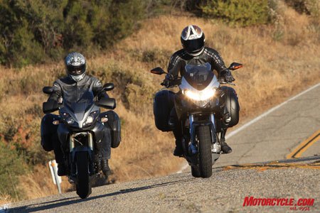 2010 triumph tiger se vs 2008 benelli tre1130k motorcycle com, The Tre K has a menacing look but its windscreen isn t as substantial as the Tiger s Here too we can see that though roomier the Benelli s Givi bags cut a wider swath