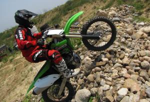 2012 kawasaki kx450f review first impressions motorcycle com, Light and precise clutch action make the KX450F surprisingly easy to ride in low traction situations