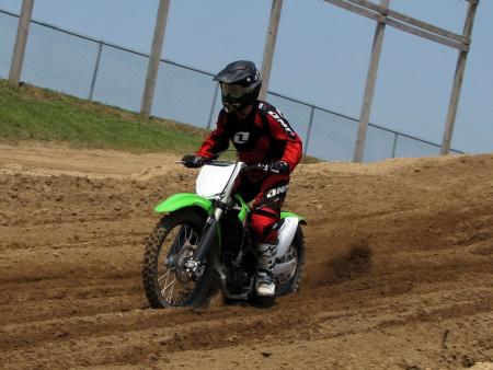 2012 kawasaki kx450f review first impressions motorcycle com, The suspension soaks up hard landings without a whimper even when pushed to the stops Small bump performance is another matter as the bike hops around too much and transmits too much track hack to the rider