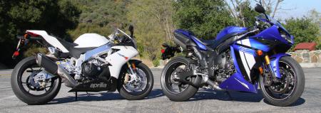 2012 yamaha yzf r1 vs 2011 aprilia rsv4 r aprc video motorcycle com, Both the 2011 Aprilia RSV4 R APRC left and the 2012 Yamaha YZF R1 have received significant electronic updates in the form of traction control