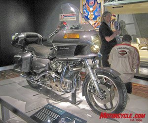 harley davidson museum grand opening, This prototype of the aborted Nova project looks more like a Honda Gold Wing than a Harley It featured a gasp 4 cylinder liquid cooled motor with the radiators hidden beneath the seat and under side covers A lack of funding during the AMF ownership days doomed the project before entering production