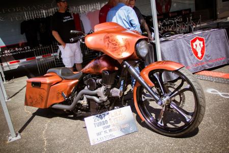 2012 laughlin river run video, Trask Performance had a variety of wild customs on display including this 2007 Harley Davidson FLHX with one of its turbo systems If you can t read the sign this 103 ci engine 1688 cc is putting out 155 hp and 160 ft lbs of torque